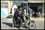 1995_IRAN_Zahedan_ ... 5 ... persons on one motorbike, a whole family - they came to see me, but I wanted to see them - a funny day ...